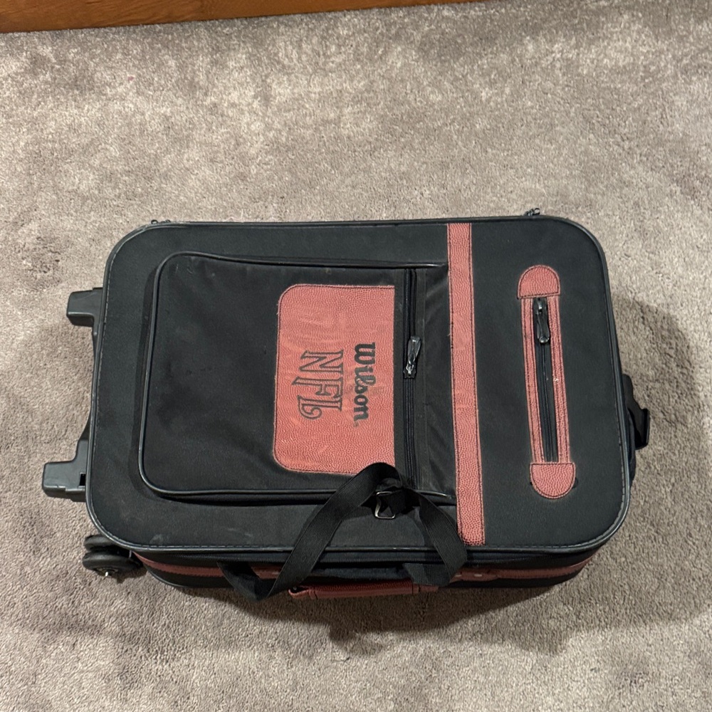 Wilson Black Football Roller Suitcase